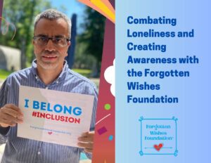 Man with glasses in a blue shirt is holding a sign that says I belong #inclusion from the Forgotten Wishes Foundation